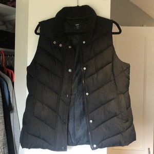 Woman’s black GAP puffer vest